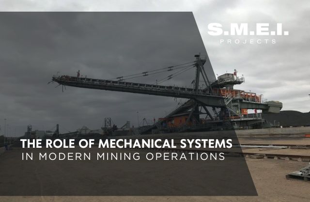 Mechanical systems in a modern mining operation, showing conveyors and heavy equipment critical to reliable material handling and production efficiency.